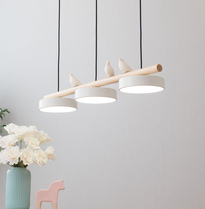 Elegant bird pendant light, nature-inspired design with adjustable LED for ambient lighting.