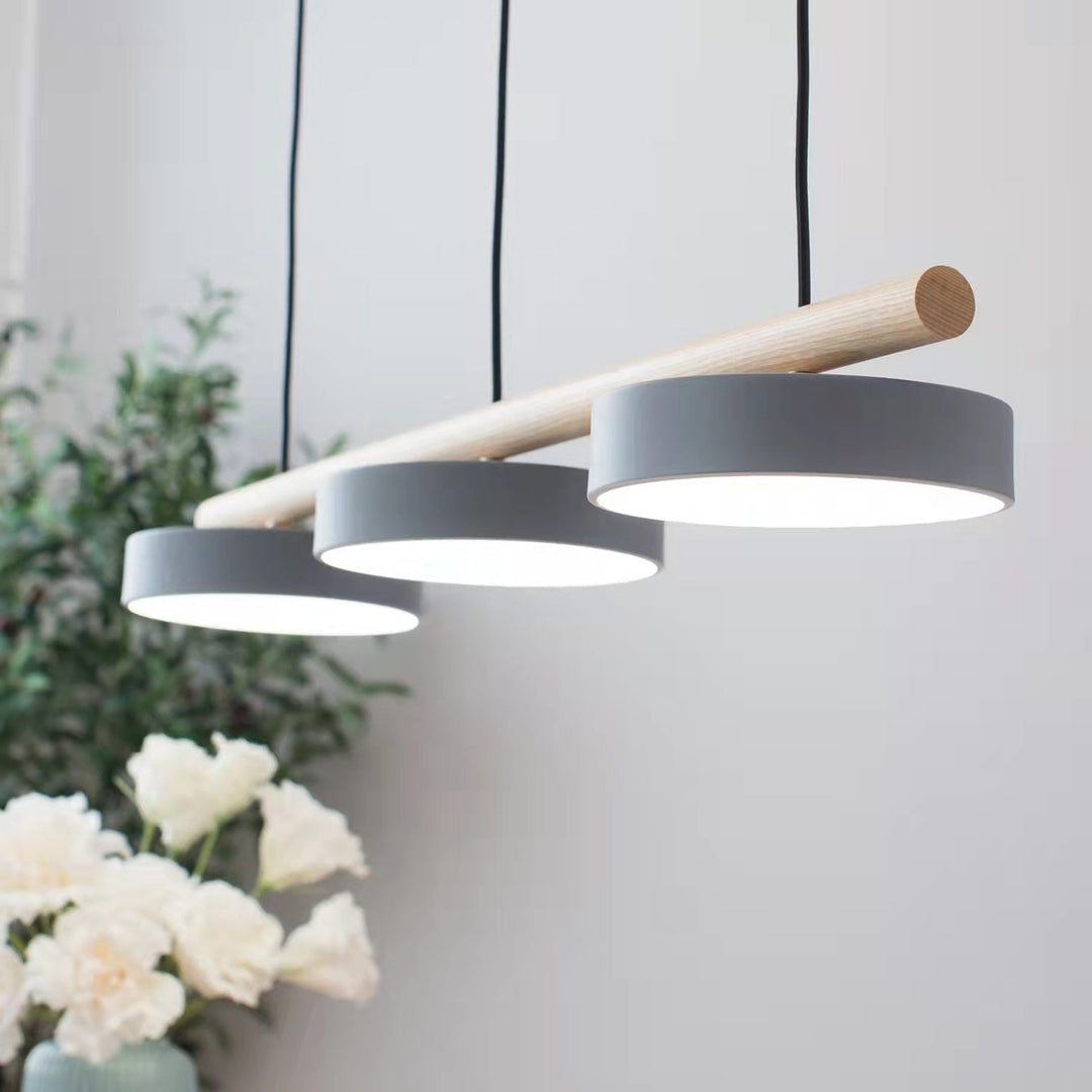 Adjustable LED pendant light featuring a unique nature-inspired bird design.
