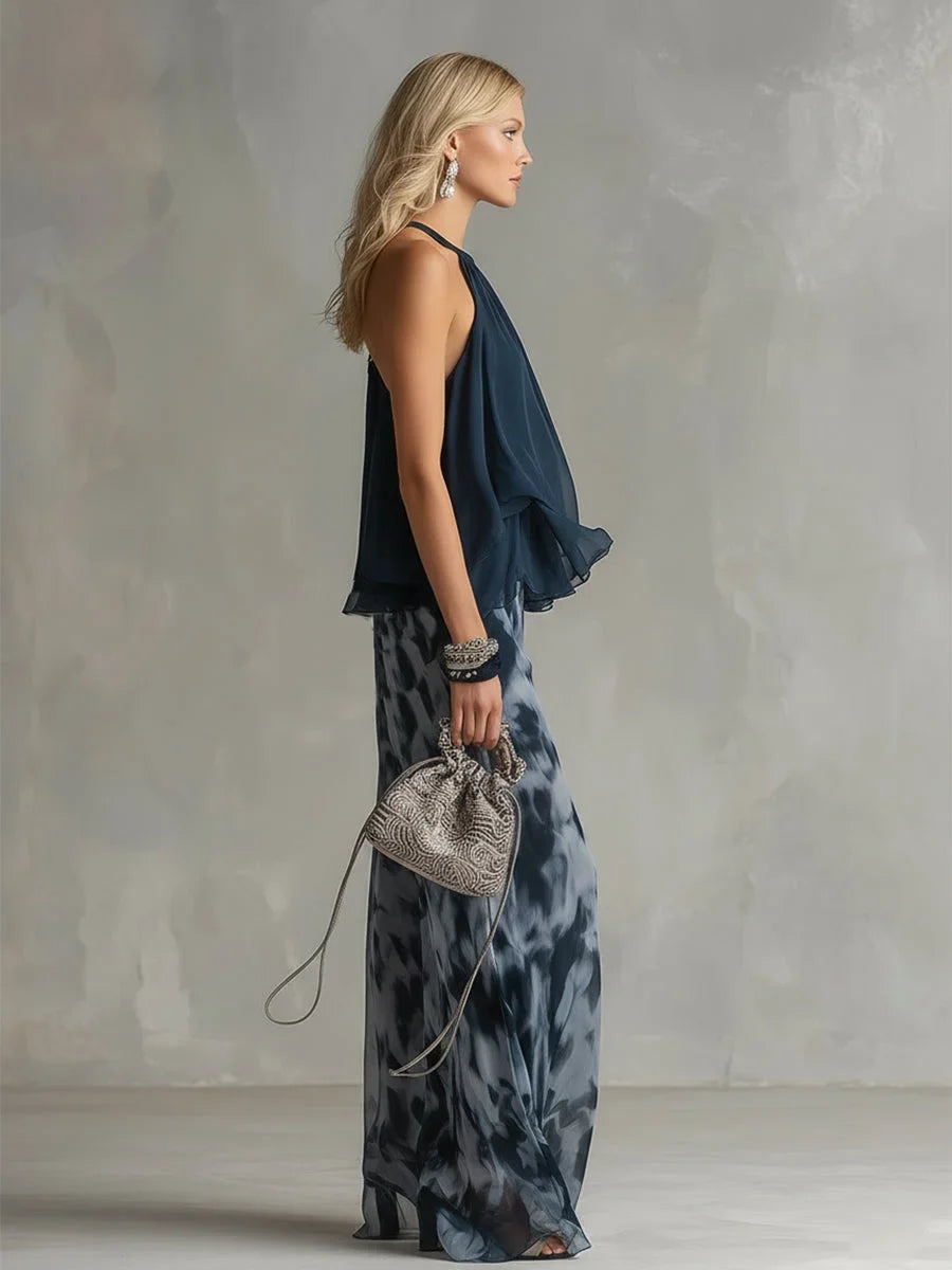 Elegant women's navy tie-dye coordinated outfit with a stylish halter top & flowing wide leg pants.