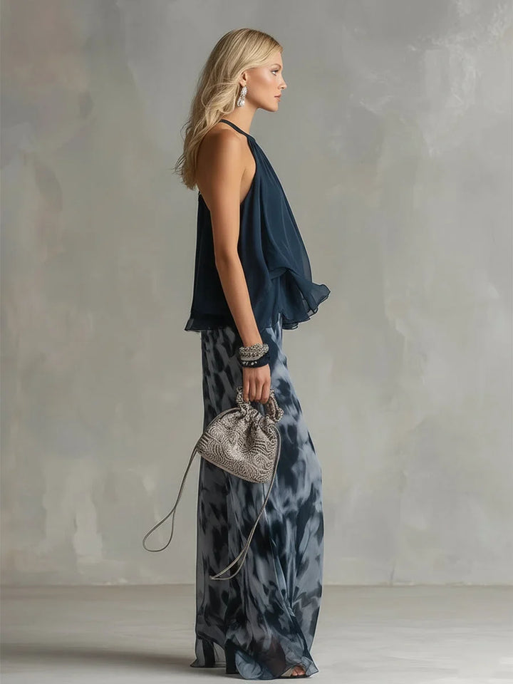 Elegant women's navy tie-dye coordinated outfit with a stylish halter top & flowing wide leg pants.