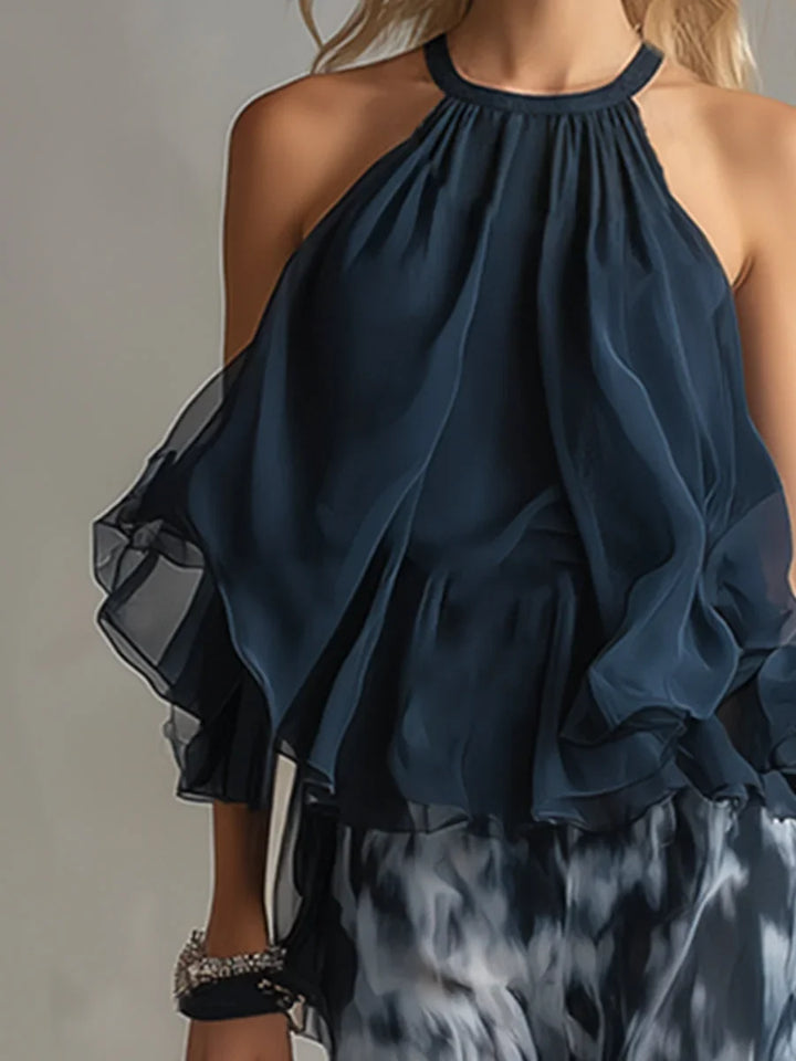 Women's tie-dye halter top with wide leg palazzo pants, a fashionable & comfortable two-piece set.