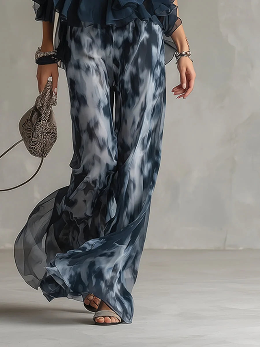 Chic women's navy tie-dye two-piece set: halter top & wide leg pants for casual or elegant summer.