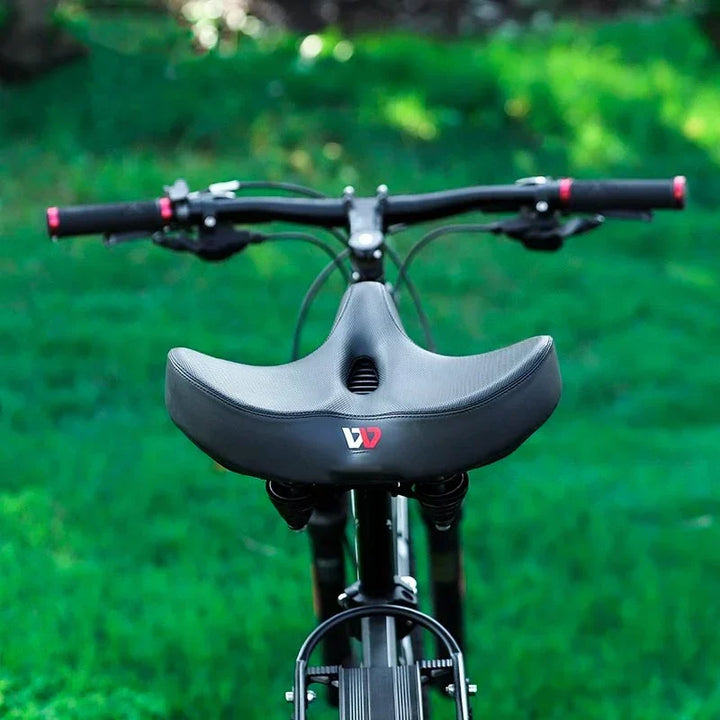 Comfortable wide bicycle saddle for maximum support and shock absorption, ideal for men and women cyclists.