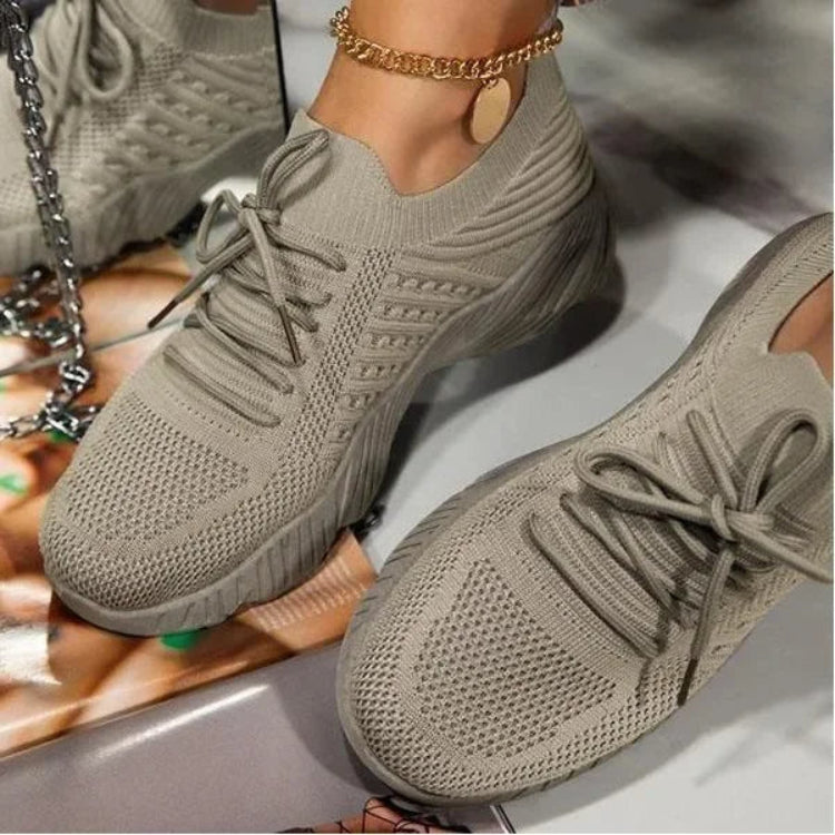 Ultra-comfortable women's walking sneakers, lightweight & breathable, lace-up design for an active and healthy lifestyle.
