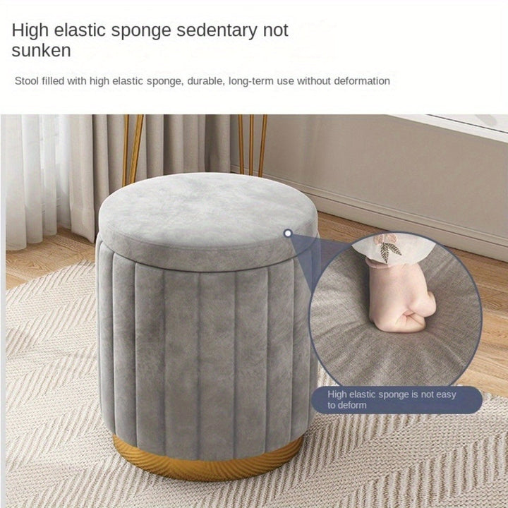 Sophisticated storage ottoman, round and sleek with a mirror finish, epitomizing Nordic Chic decor.