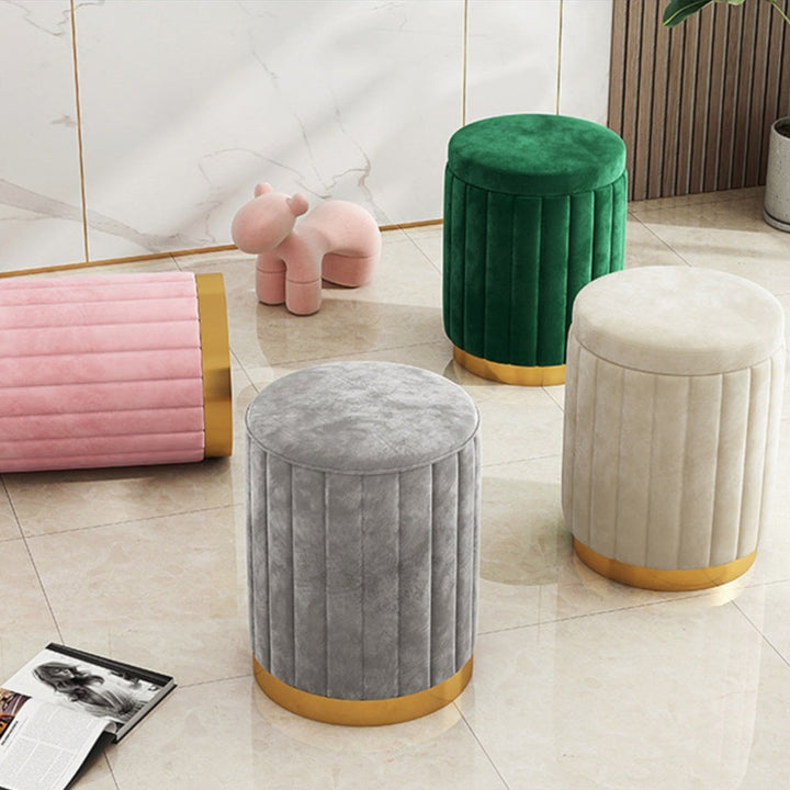 Nordic Chic home decor: A round storage ottoman with a captivating mirror finish, perfect for any room.