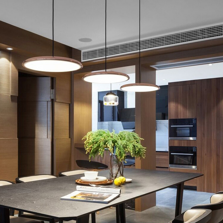 Energy-efficient Nordic Glow LED pendant lamp providing a warm glow for living room decor.