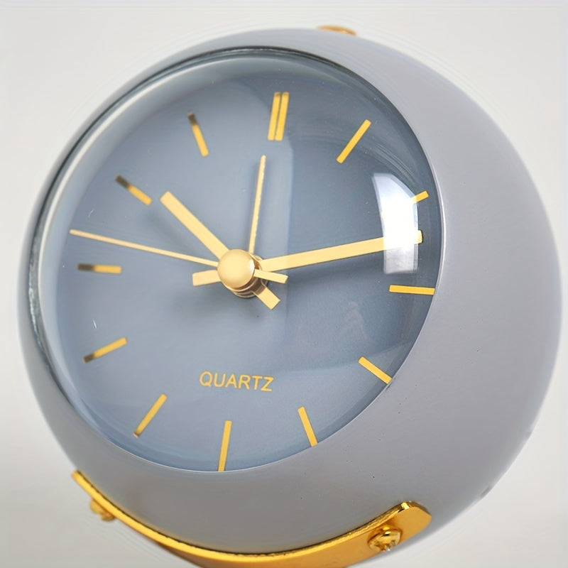Sleek Nordic silent desk clock, metal frame, luminous hands, ideal for modern home or office.