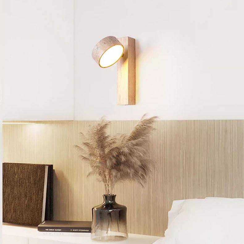 Elegant off-white Wabi Sabi wall lamp made of natural travertine, offering a warm LED glow.