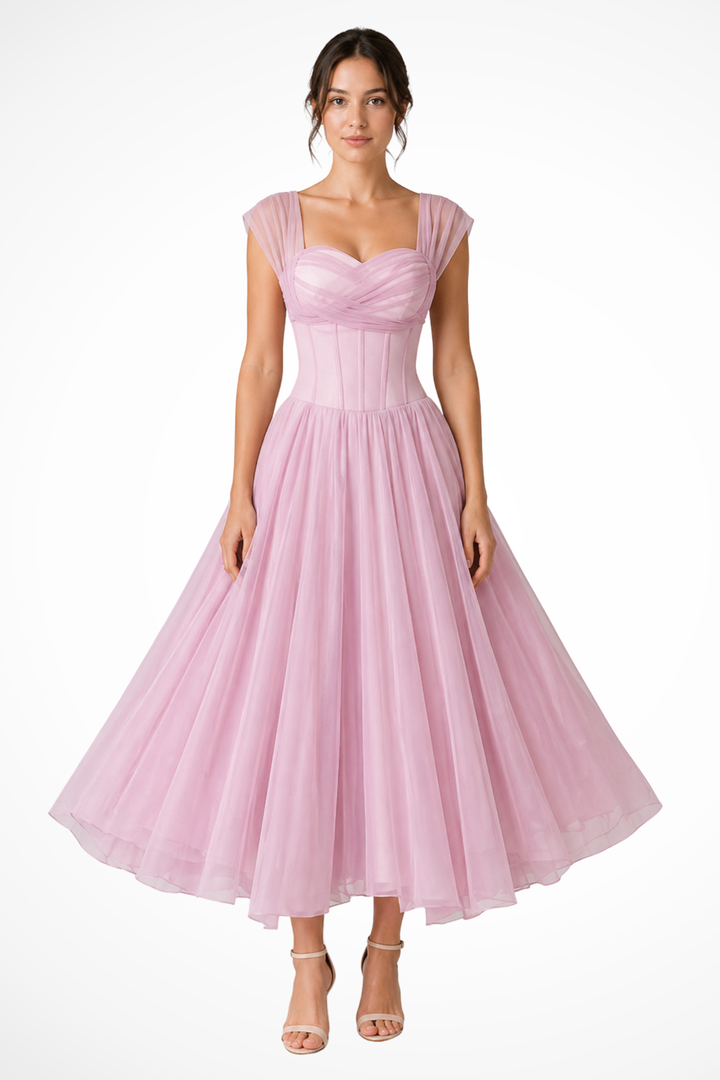 Chic pink sweetheart midi dress for wedding guests. Flared formal women's fashion, elegant evening attire.