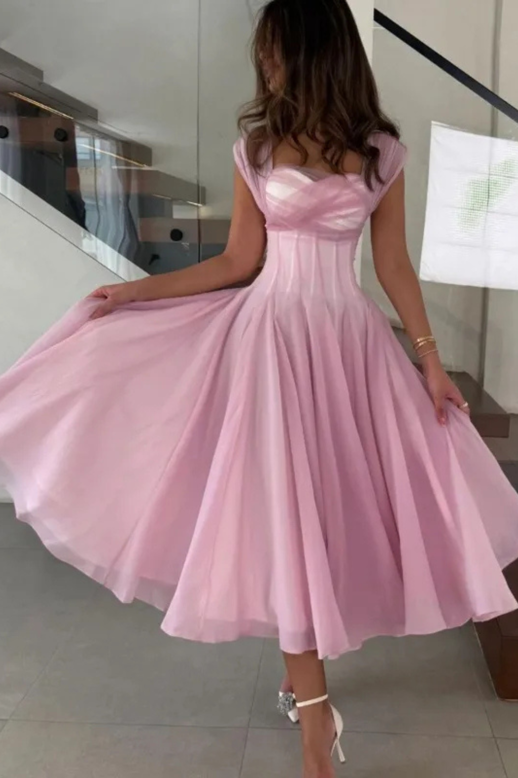 Stylish pink formal midi dress, sweetheart neckline. Flared silhouette, perfect for wedding guests & evening events.