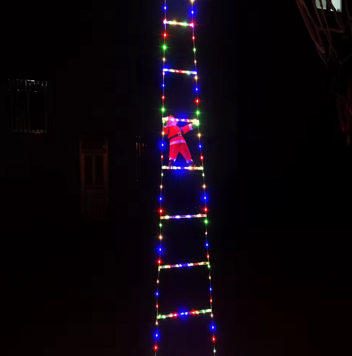 Festive outdoor Christmas climbing Santa ladder decoration, bringing holiday cheer to your yard & display.