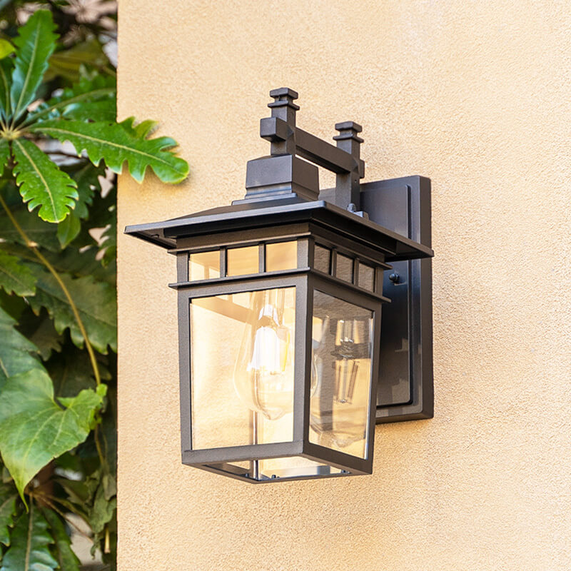 Intricate design of a waterproof outdoor lantern wall light, enhancing garden & exterior decor.