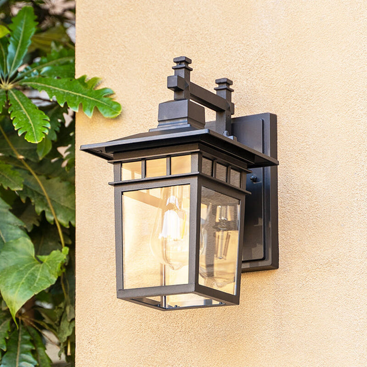 Intricate design of a waterproof outdoor lantern wall light, enhancing garden & exterior decor.