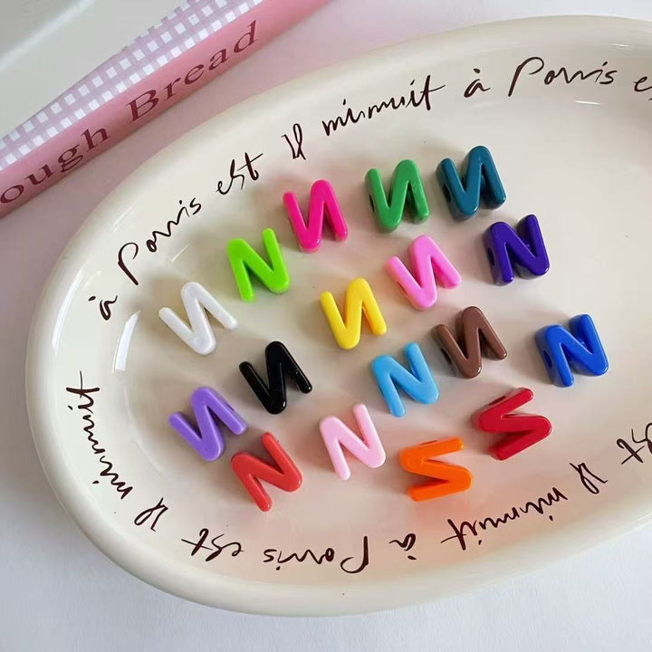 Stylish 'E' personalized letter keychain, a unique accessory & charm.