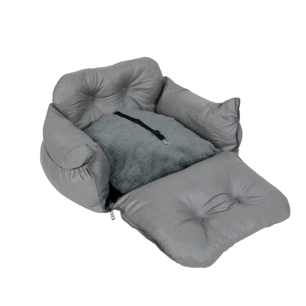 Comfortable pet car bed with adjustable safety harness for small to medium dogs.