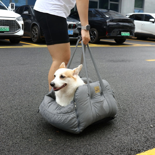 Secure pet car seat with safety harness, plush dog bed for stress-free journeys.