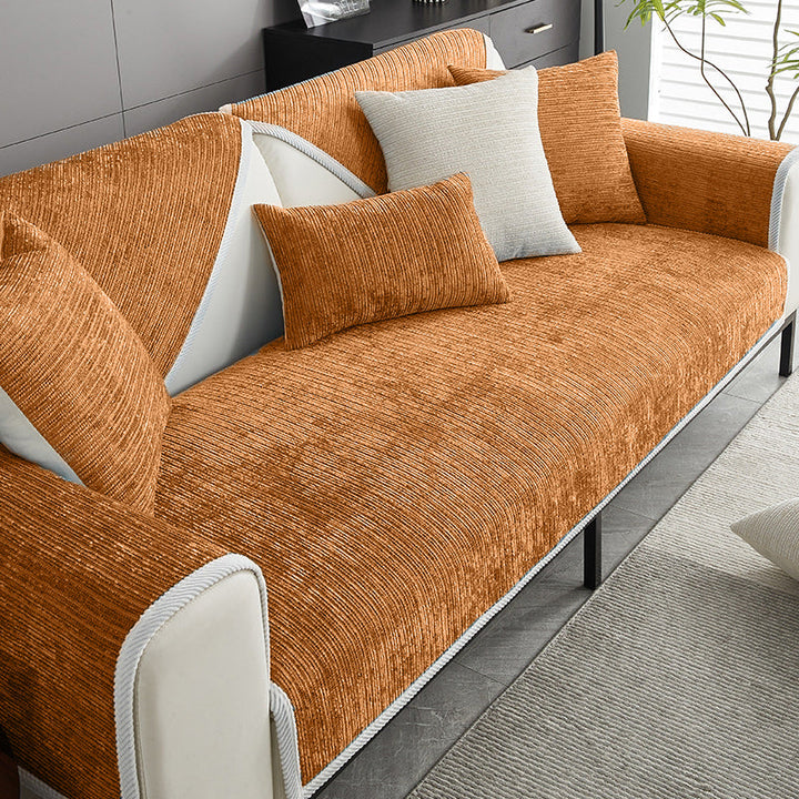 Golden retriever relaxing on a durable, pet-friendly striped chenille anti-scratch couch cover.