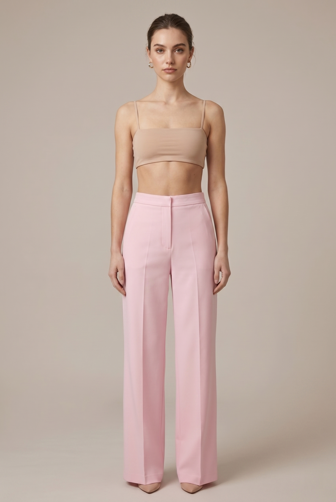 Women's pink tailored pant suit with unique feather cuffs. Perfect for formal events & work.