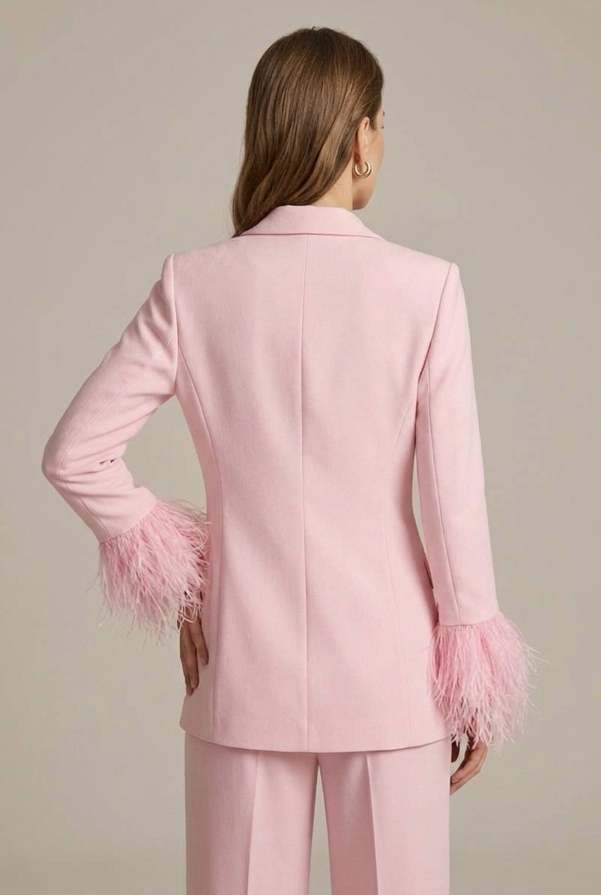 Elegant women's pink evening suit with feather cuff blazer & smart straight leg trousers.