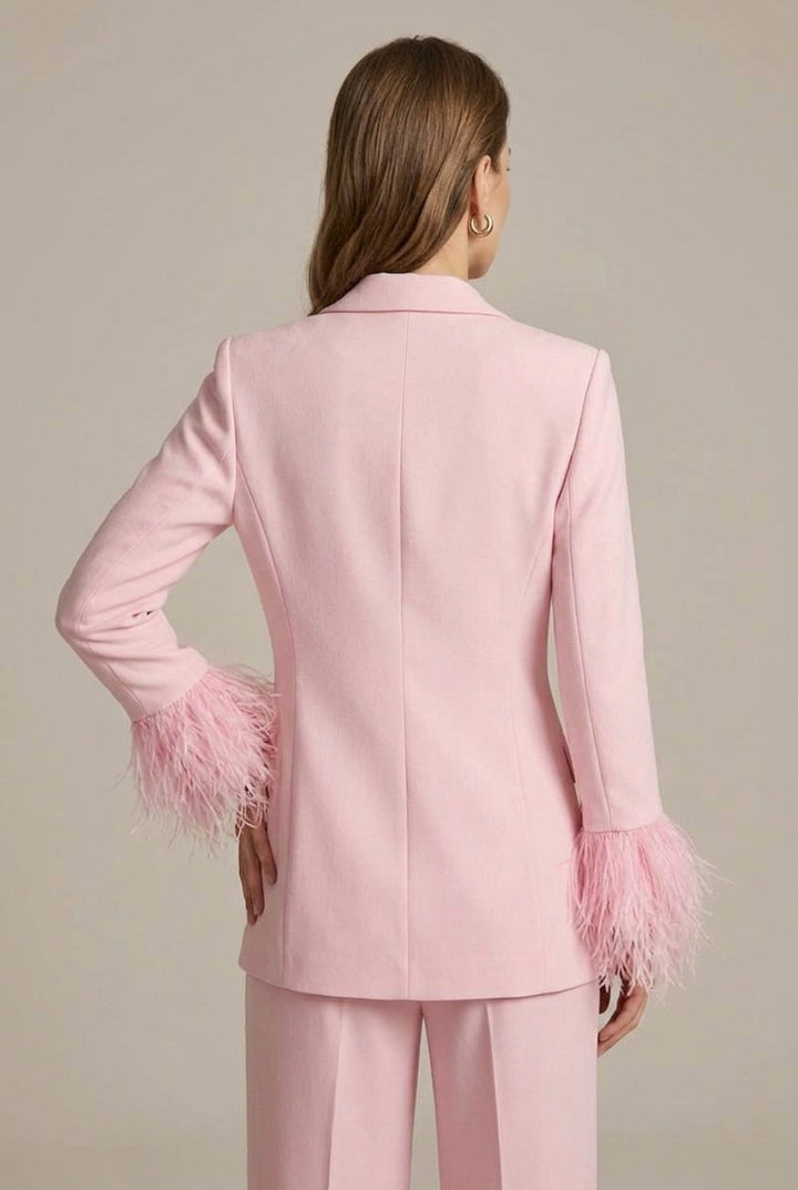 Elegant women's pink evening suit with feather cuff blazer & smart straight leg trousers.