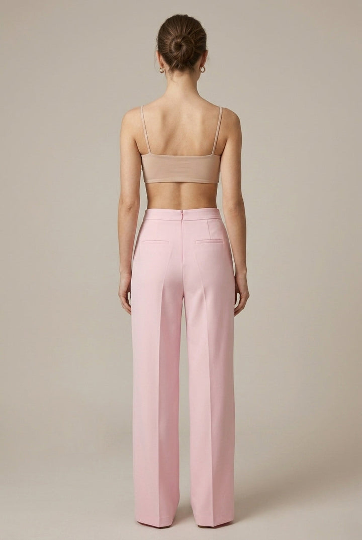 Pink feather cuff blazer & straight leg trousers suit. Women's stylish office & formal attire.
