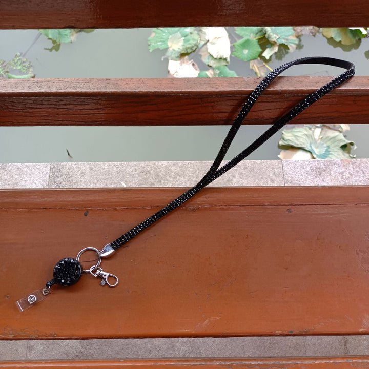 Sparkling women's handbag charm and keychain. Glamorous decorative accessory, ideal fashion gift.