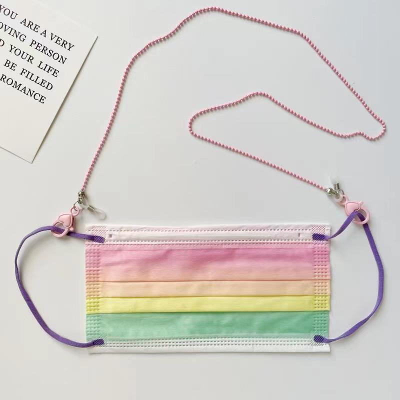 Pink heart design phone chain holder. Secure & stylish phone strap for women, offering hands-free convenience.