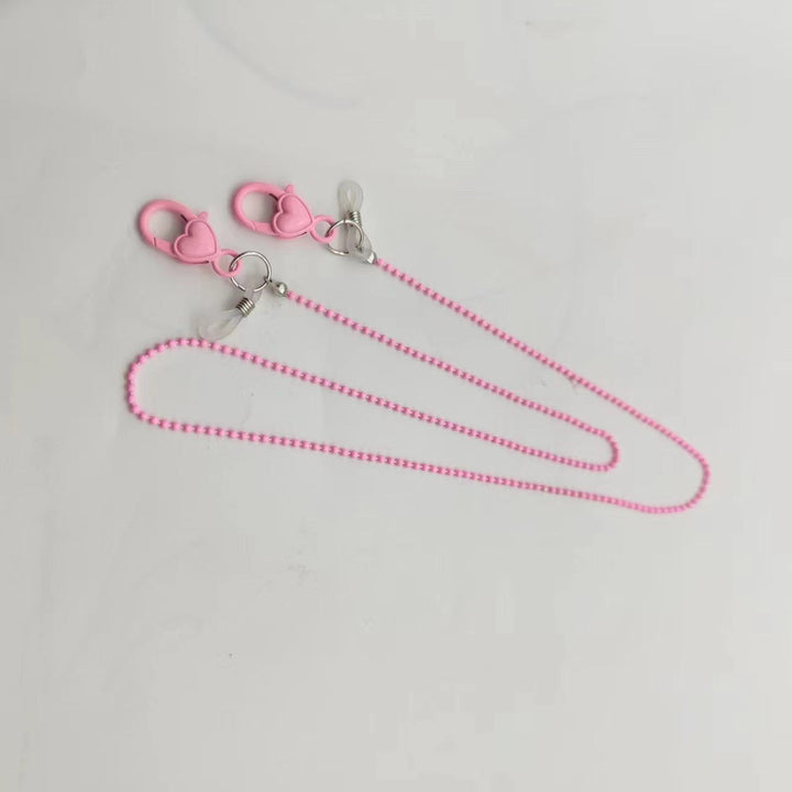 Women's stylish pink phone chain. Fashionable smartphone strap for hands-free security & easy access.