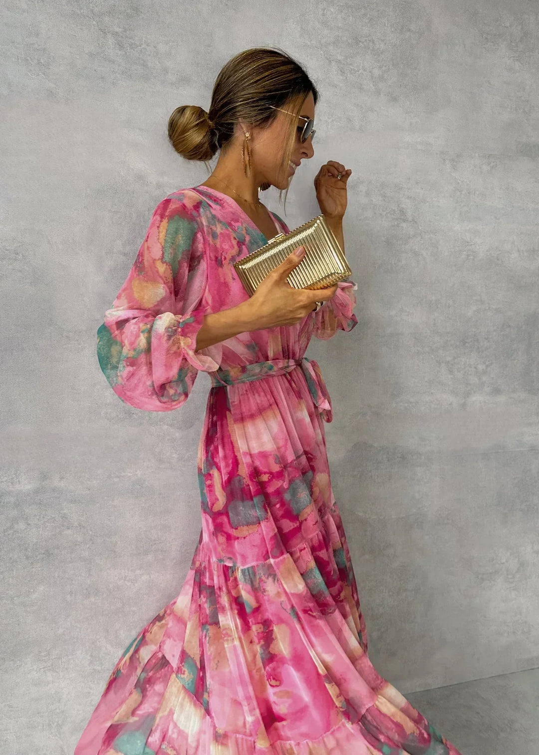 New women's flowy long sleeve summer dress in pink. Modern casual style, comfortable fit for versatile day to night fashion.