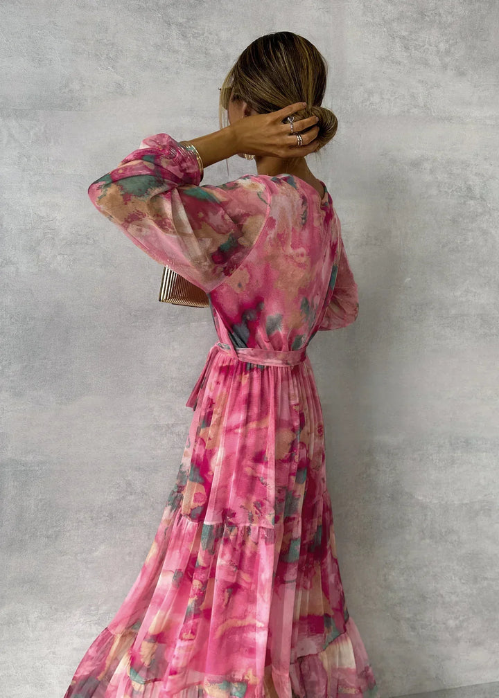 Effortless pink long sleeve women's summer dress. Flowy design with comfortable fit, perfect for modern casual day to night wear.