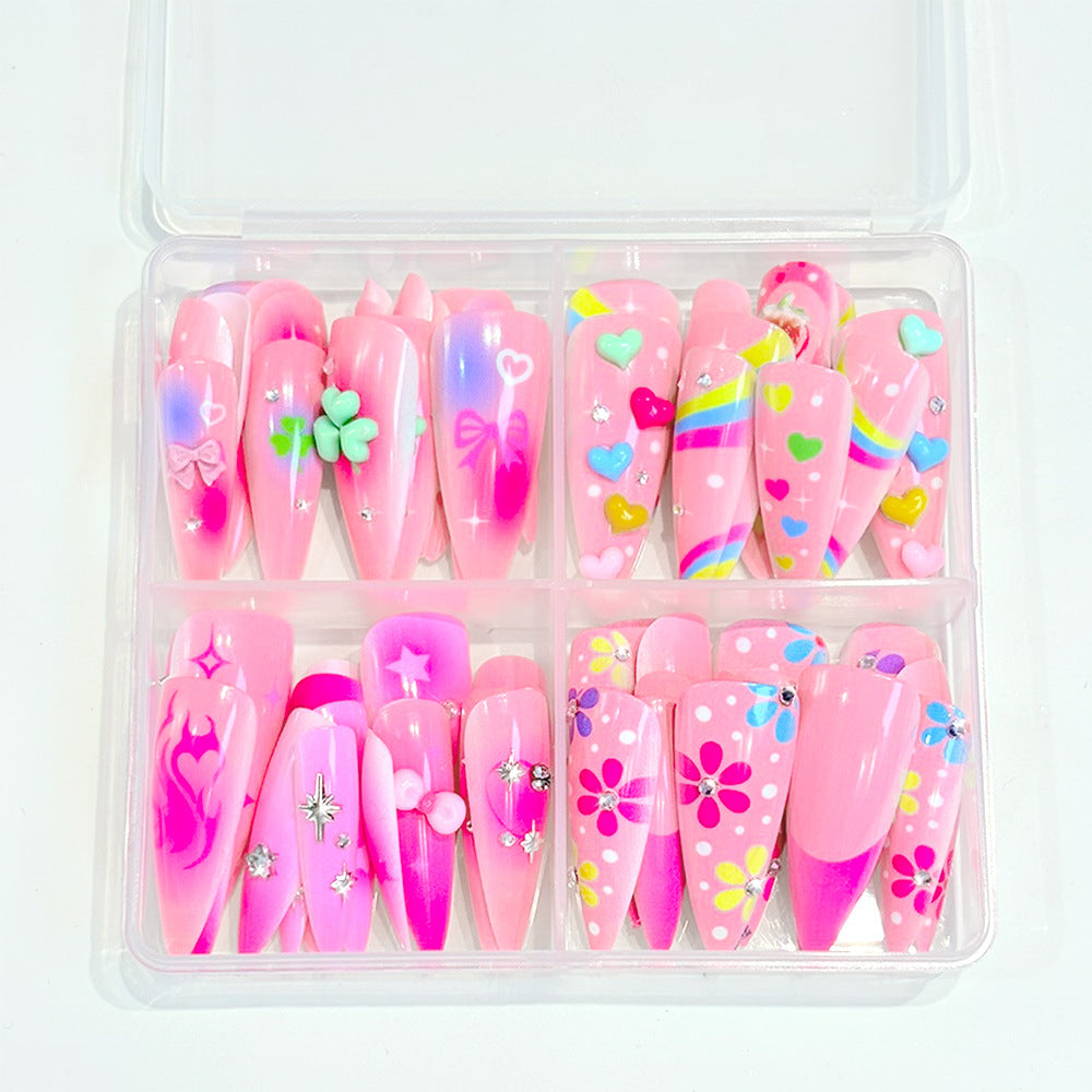 Easy-application fake nail set for women, featuring vibrant, expressive nail art designs for a quick, playful manicure.