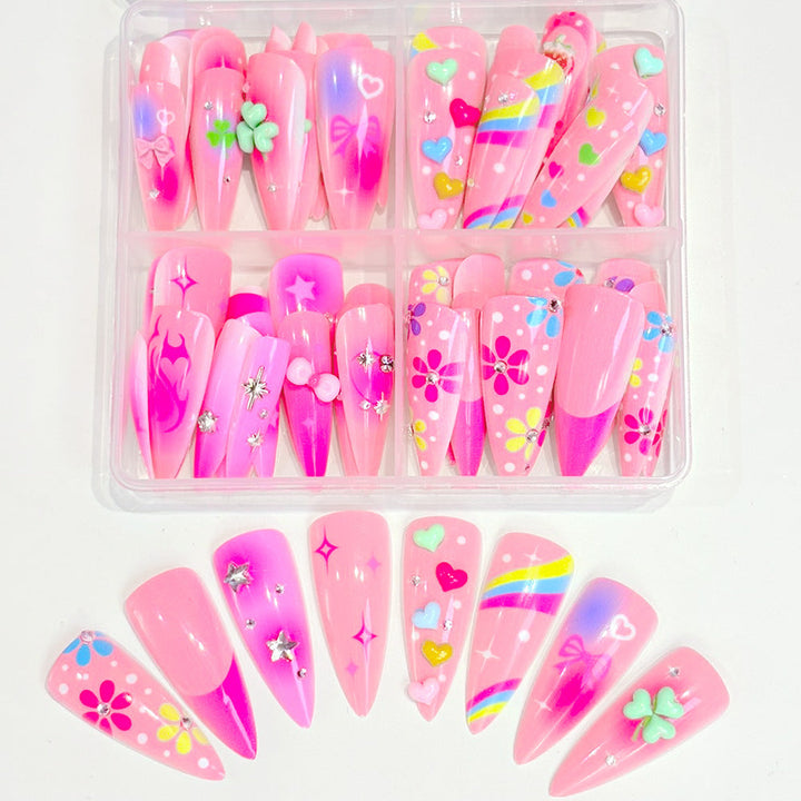 Expressive women's press-on nails with vibrant, long-lasting designs for an easy and fun DIY manicure.