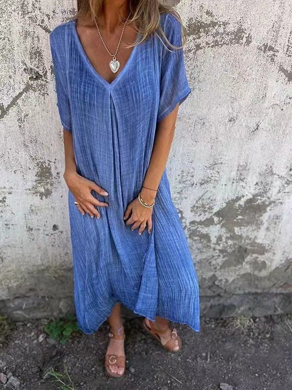 Versatile women's plus size V-neck maxi dress. Loose fit, short sleeves, ideal for casual summer fashion.