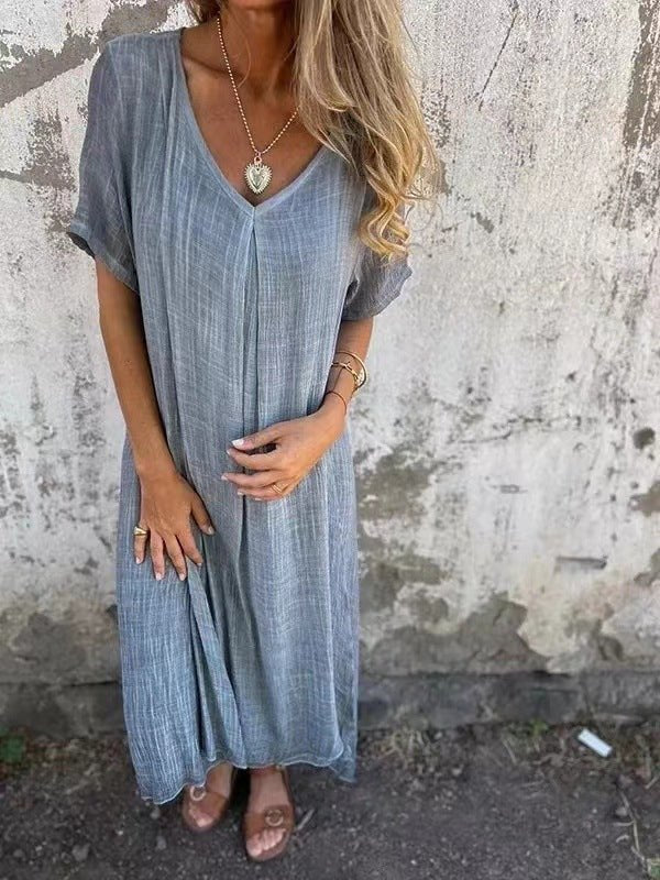 Comfortable loose fit plus size V-neck maxi dress for women. Short sleeve casual summer wear.