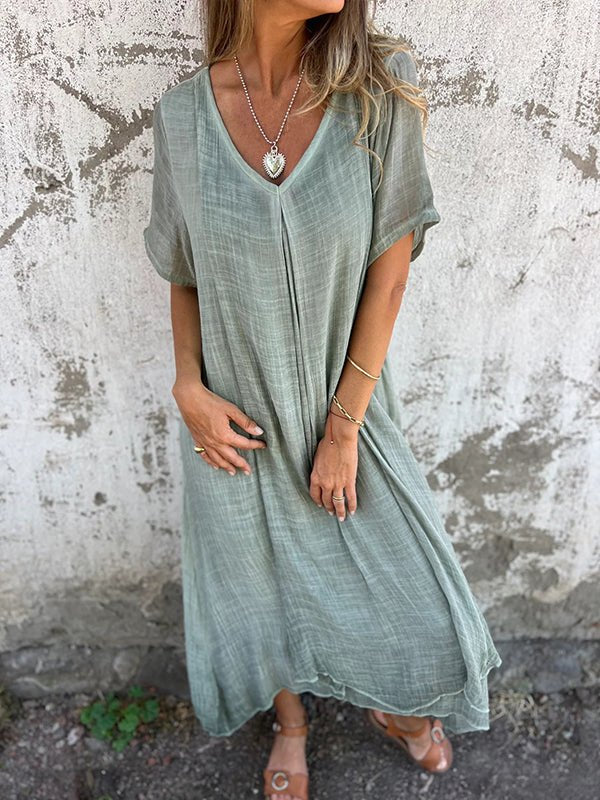 Women's plus size V-neck maxi dress. Short sleeve, loose fit for ultimate comfort & casual summer style.
