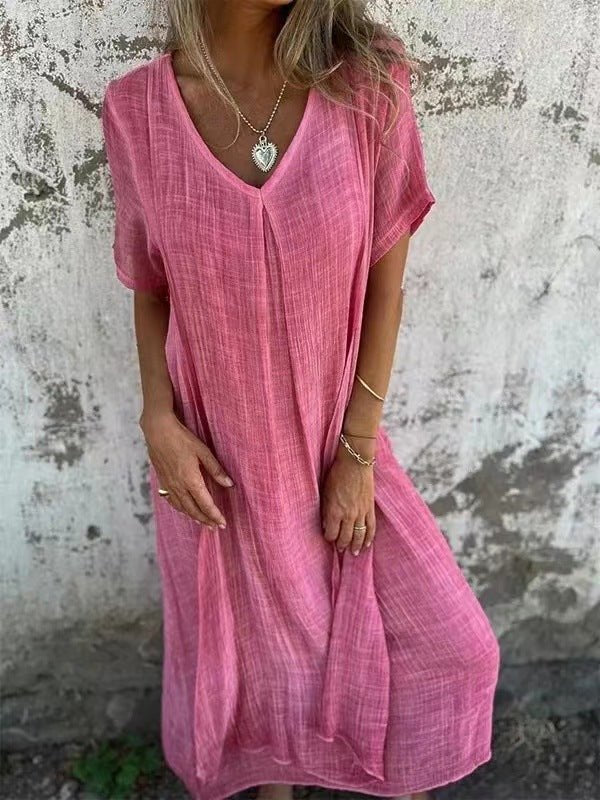 Stylish women's plus size V-neck maxi dress, short sleeve. Loose, comfortable fit for versatile summer apparel.