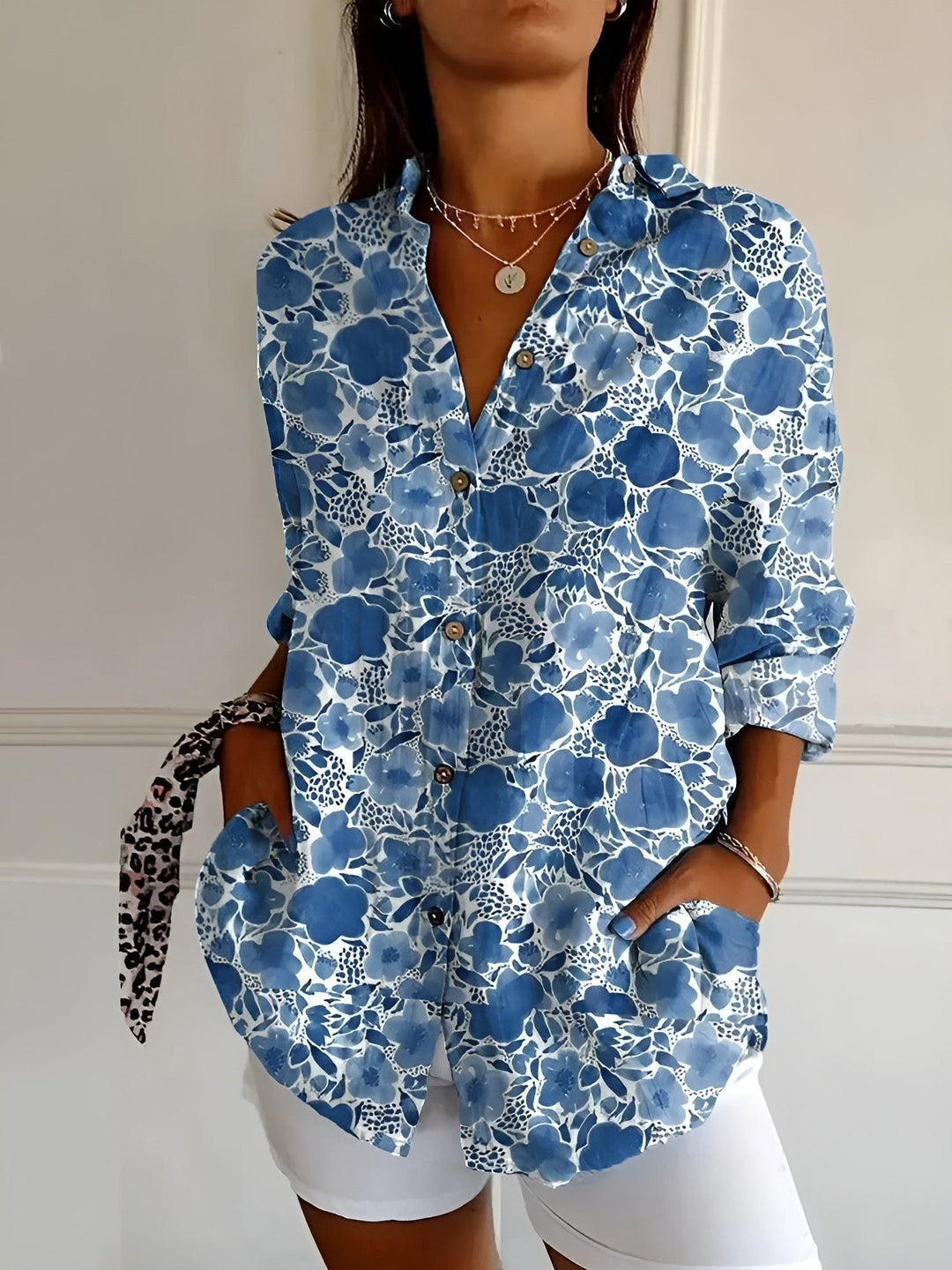 Plus size women's blue floral print long sleeve button-up shirt, a casual & elegant blouse for various looks.