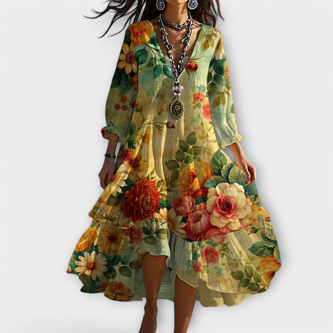 Plus size women's boho floral V-neck tiered midi dress with 3/4 sleeves, perfect for casual summer wear.