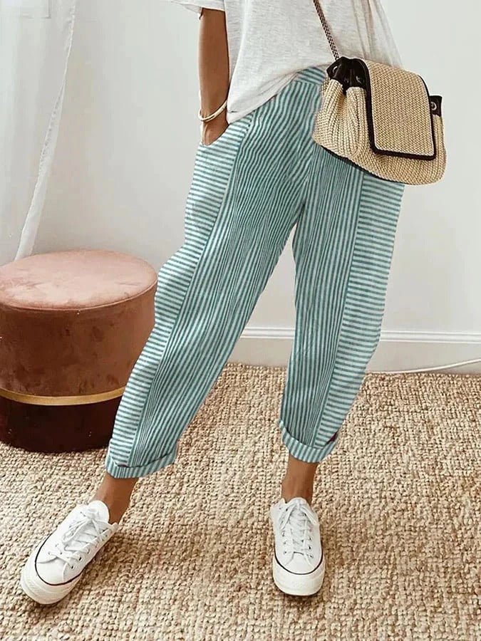 Women's relaxed fit plus size striped trousers, perfect for loungewear with an elastic waist.