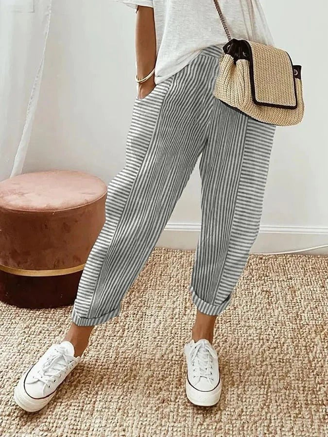 Breathable plus size striped casual trousers for women, elastic waist and comfortable relaxed fit.