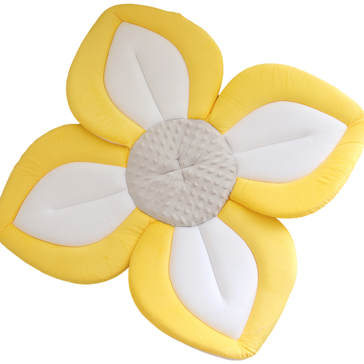 Comfortable plush flower infant bath seat for sink. Offers soft support for newborns & babies during bathtime.