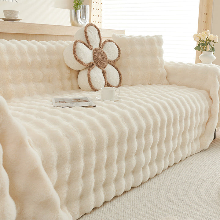 Light gray plush sofa cover, soft faux fur non-slip design, modern home decor & protection.
