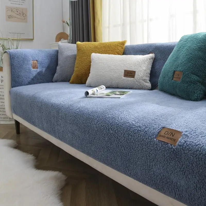 Pet-friendly Sherpa fleece sectional sofa cover, waterproof & non-slip. Plush comfort & durable furniture protection.