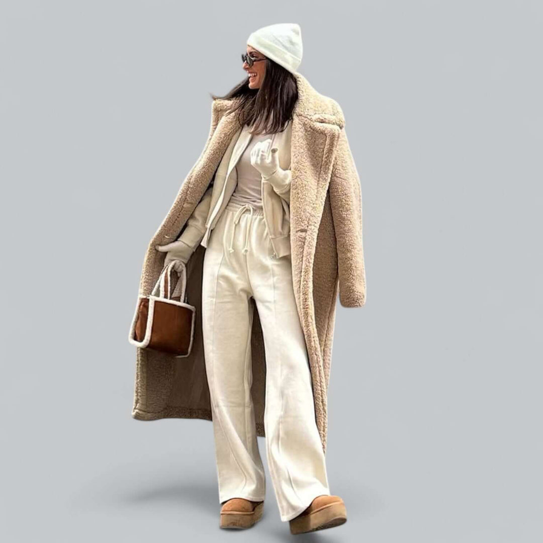 Elegant women's teddy long jacket, stylish winter fashion apparel.