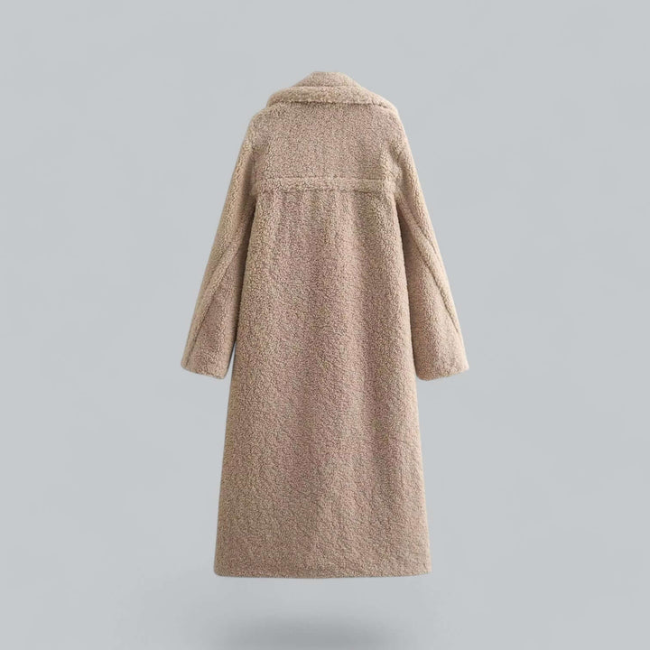 Stylish women's long teddy coat, perfect for elegant winter fashion & warmth.
