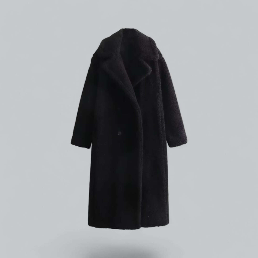 Cozy women's long teddy coat, a stylish and warm winter fashion statement.