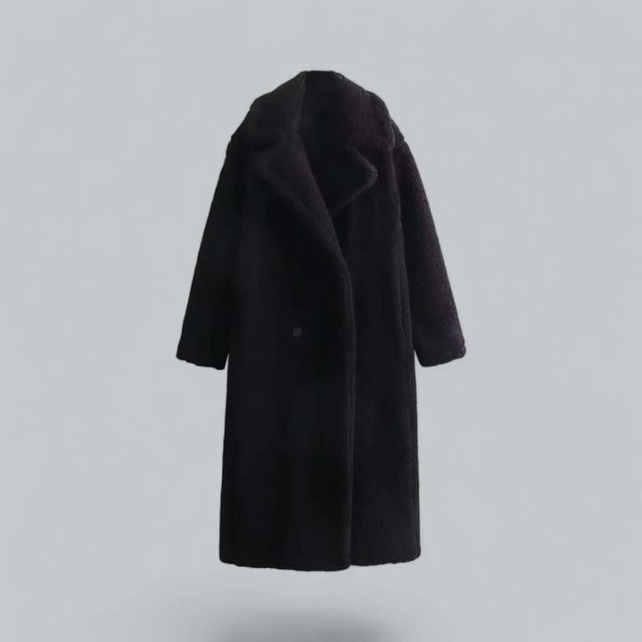 Cozy women's long teddy coat, a stylish and warm winter fashion statement.