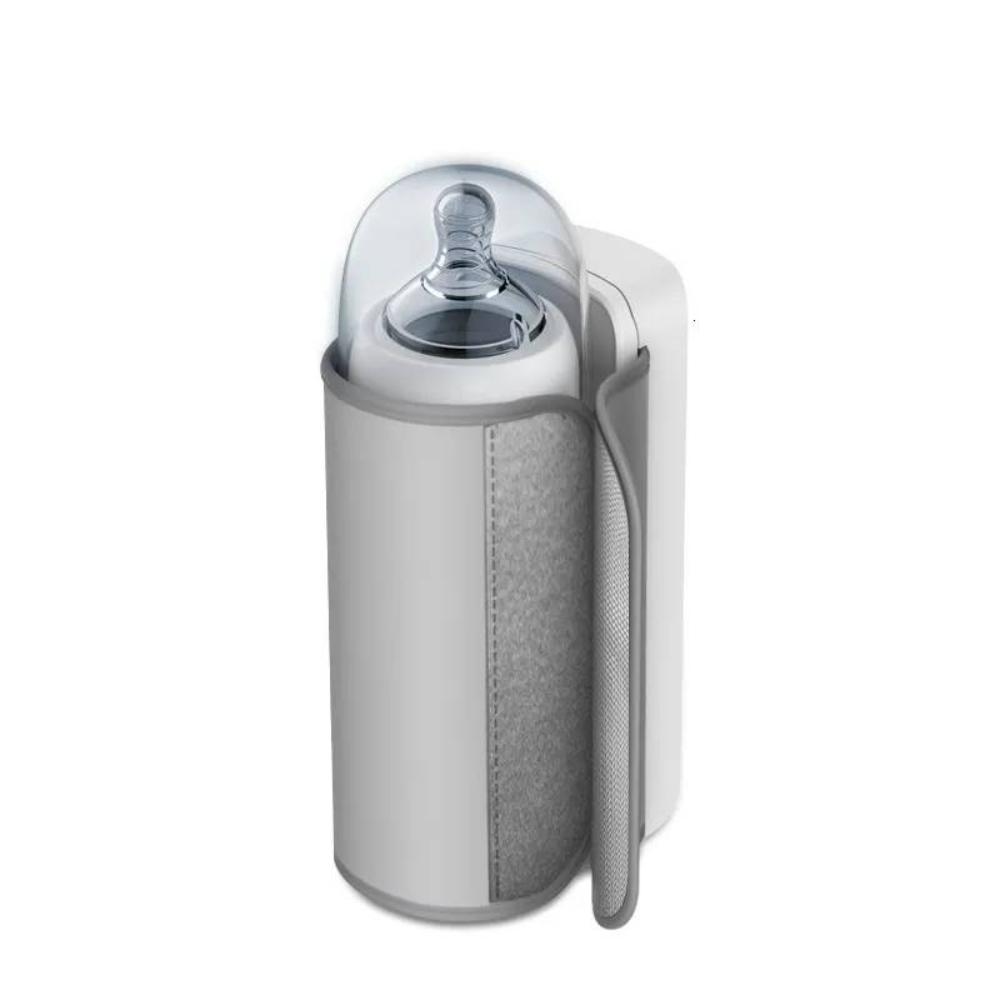 Essential travel bottle warmer for new parents, ensures warm milk with digital temperature control.
