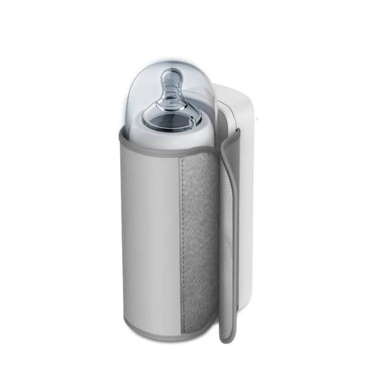 Essential travel bottle warmer for new parents, ensures warm milk with digital temperature control.